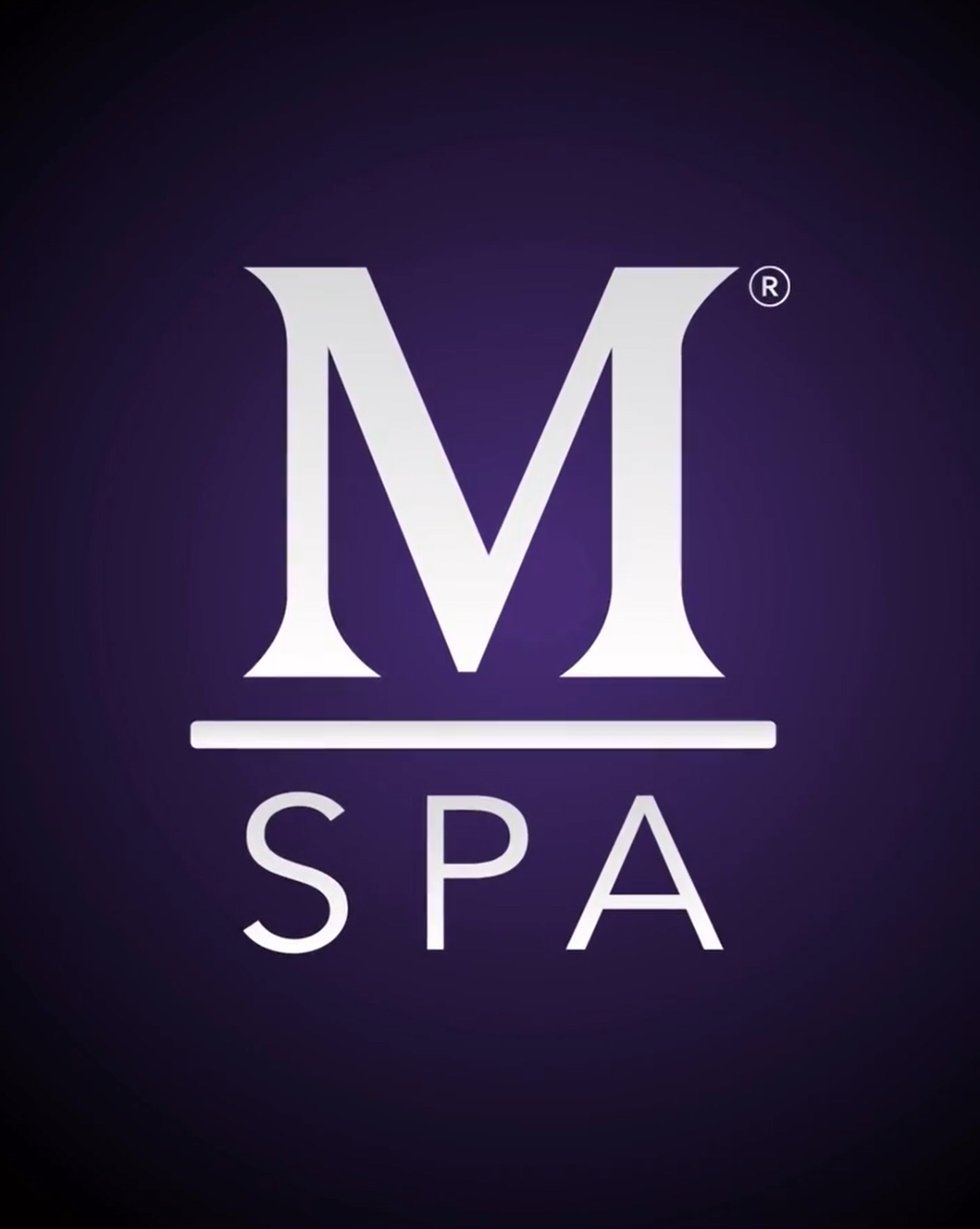 M Spa Logo on black and purple background