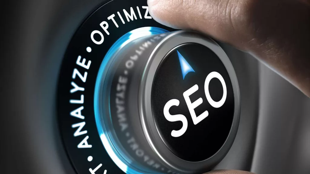 A finger about to press an SEO button surrounded by a neon blue ring, indicating SEO strategy activation.